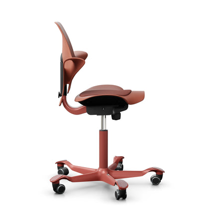 HÅG Capisco Puls 8010 in Rosehip with CPT4301 Coral and a Blush Rose frame, side