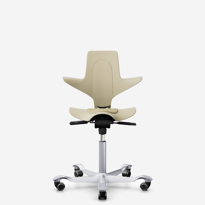 HÅG Capisco Puls 8010 ergonomic saddle office chair in Sand, silver base
